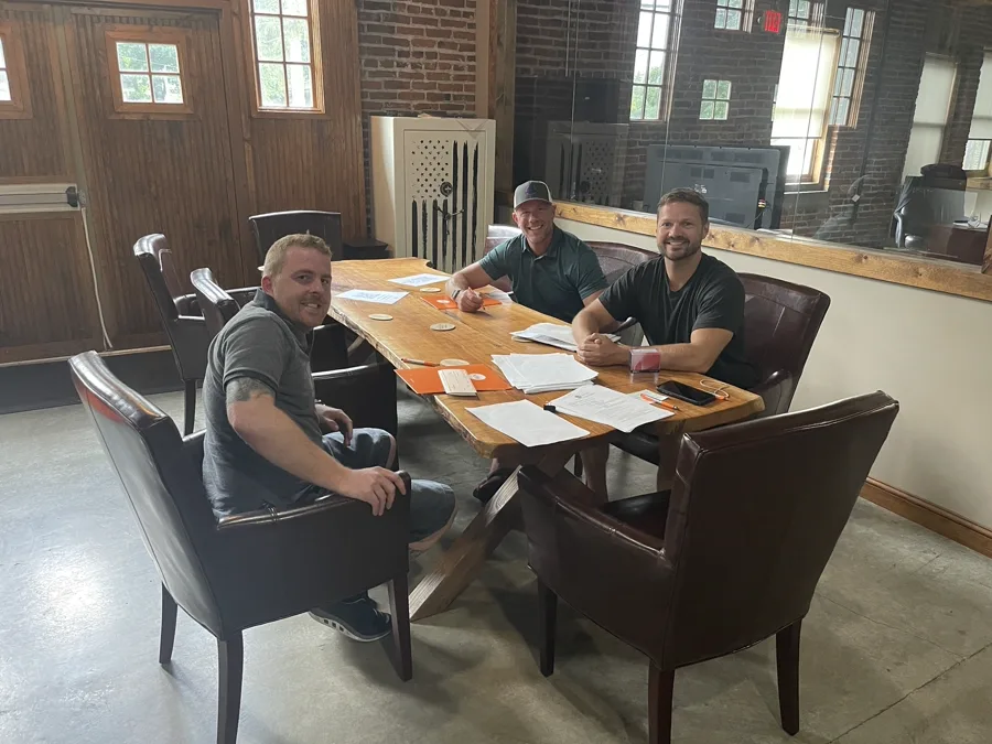 Sellers and Mike Wall at the closing table — cash home sale Dayton Ohio