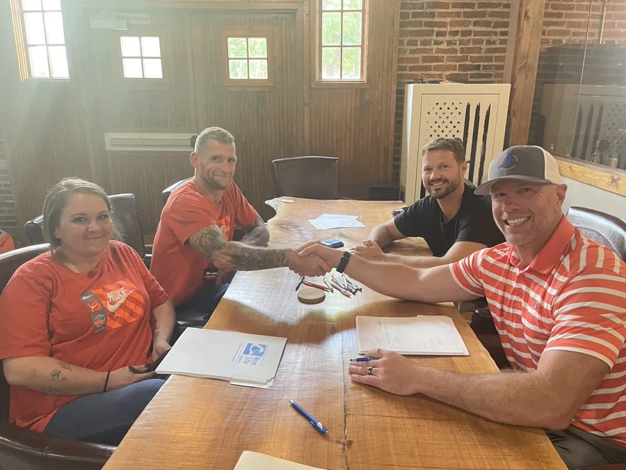 Handshake at closing — EZ Sell Homebuyers Dayton Ohio cash sale